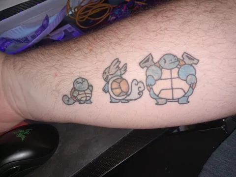 My tattoo of my favorite pokemon line (not a great tattoo, artist was new. i dont mind)