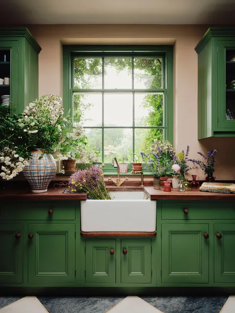 Utility room with green cabinetry in a Georgian country house, Oxfordshire, England [2300x3067]
