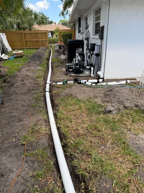 Hurricanes kept flooding my backyard so I buried 140ft of drainage pipe to prevent it.