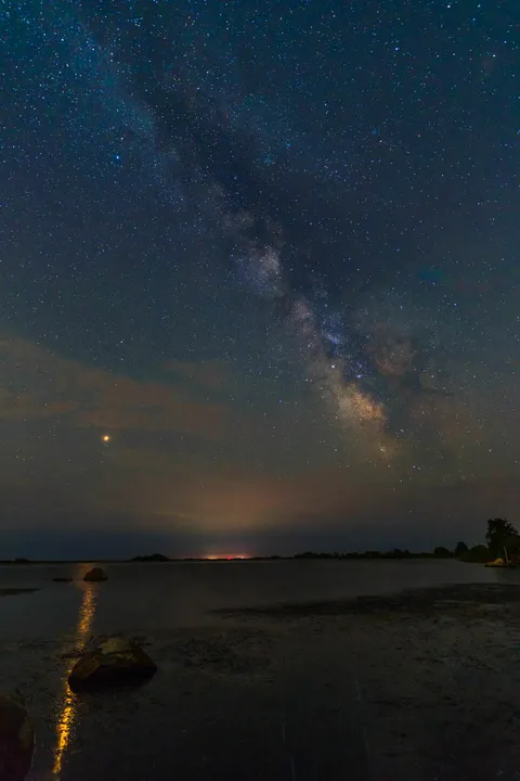 Right now Mars is closer and brighter than it’s been since 2003. It’s so bright it’s casting a reflection on the ocean as it rises. Took this two nights ago in Rhode Island