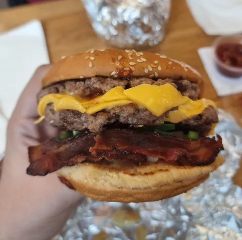 [I ate] A bacon cheeseburger from Five Guys.
