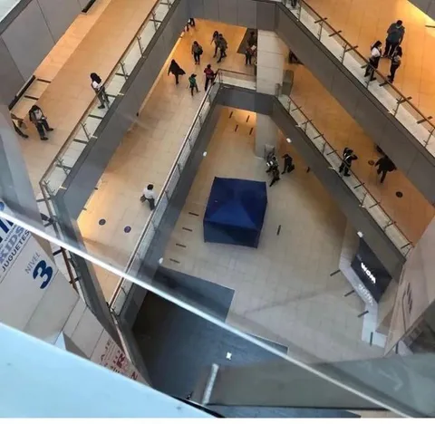 Giant mall in my country. Someone killed themselves and they just cover it up with a tent and people keep going about their business like any other Tuesday.