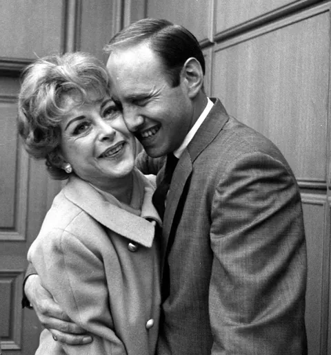Hedy Lamarr smiling with her lawyer Jordan M. Wank after being acquitted in Los Angeles, 1966