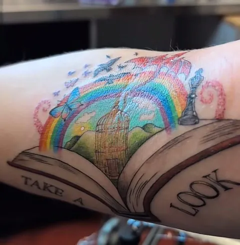 Awesome book tattoo by Witch of Waste in Wyoming. Who gets the reference???