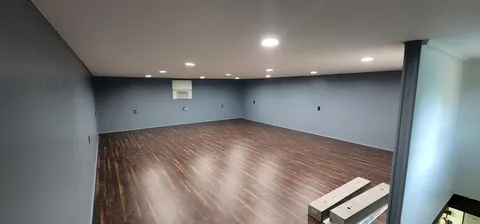 Finished the 2nd floor of my garage into a Home Theatre and Gym.