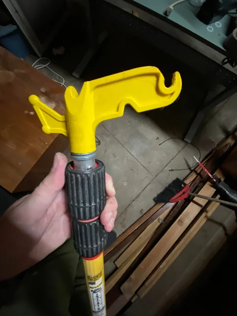 How I hang my Christmas lights with magnets and a long pole