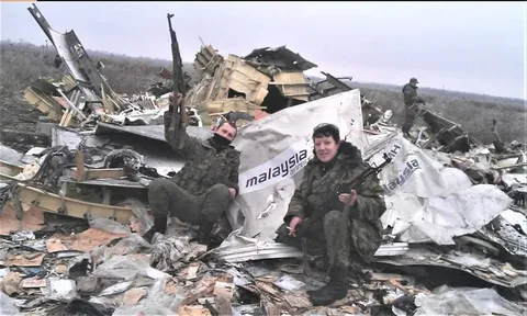 Russian soldiers are photographed near the downed Boeing MH17. It happened exactly 10 years ago