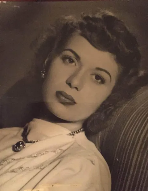 My grandma turns 94 today. Here is a picture of her in 1956 at 25