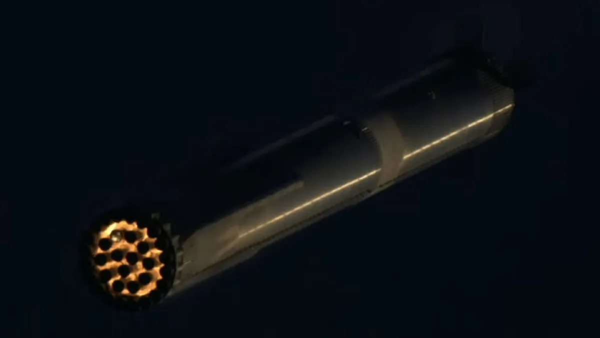 Screencap from Tim Dodd's (Everyday Astronaut) livestream, showing clearly the glowing engine section, likely from reentry heating.