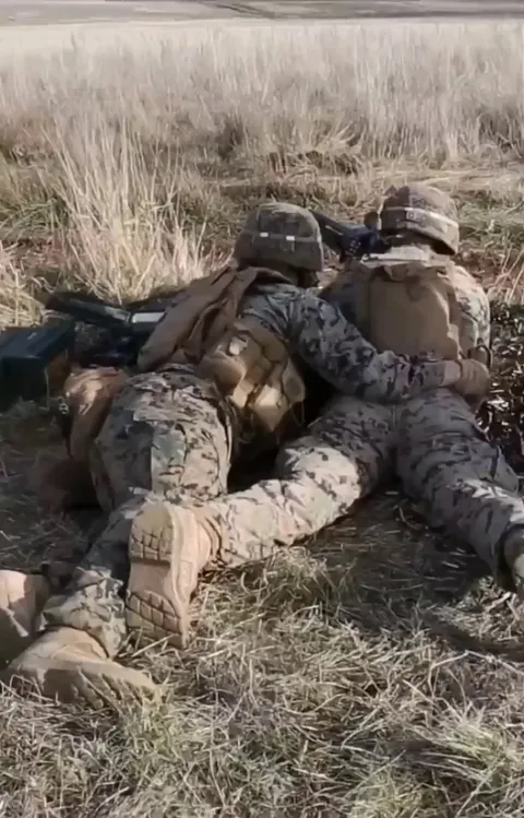 Marines performing dead-gunner drills.