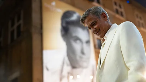 First Image of George Clooney in Noah Baumbach's 'Jay Kelly' - Two middle-aged friends (Clooney and Adam Sandler) rediscover their youthful spirit during a chaotic weekend reunion, facing hilarious mishaps and heartfelt moments that force them to finally grow up.