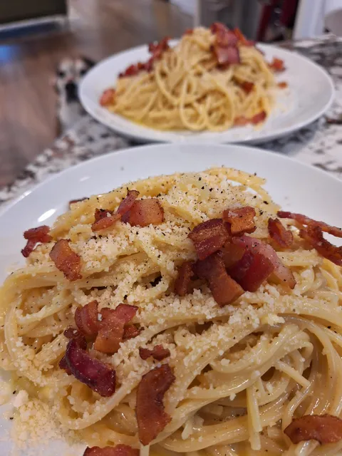 Spaghetti with sauce made of pork, eggs, and parmesean [homemade]