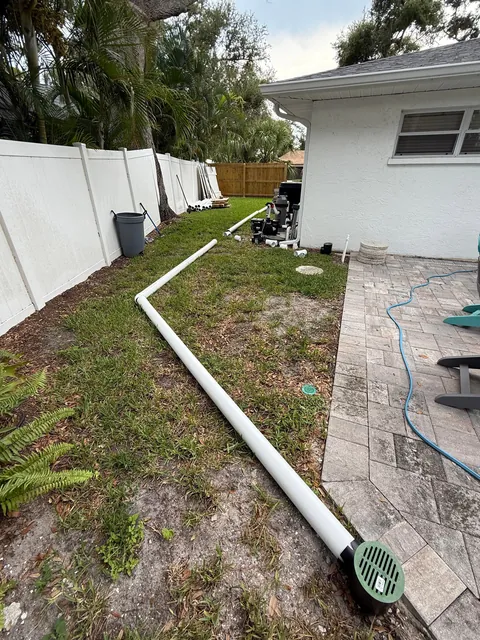 Hurricanes kept flooding my backyard so I buried 140ft of drainage pipe to prevent it.