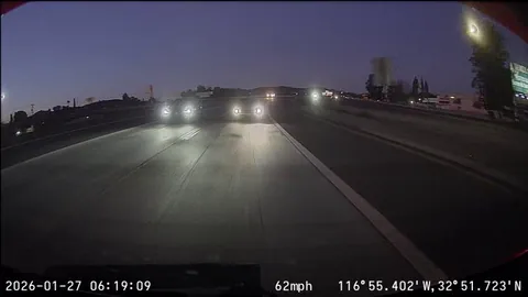 [Oc] Idiot speeds up to to ride the back of my car, where two lanes become one, to not let another driver merge and nearly causes a crash into a street sign.