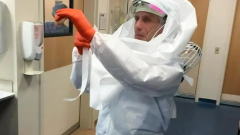 74 year old Dr Fauci suiting up in 2015 to treat an Ebola patient