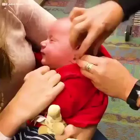A Baby's Joyful Reaction Upon Hearing Parent's Voice After Getting A Hearing Aid