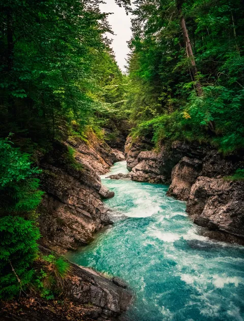 This mountain creek Rißbach is in fact also the border between Germany and Austria. (OC) [1458x1920]