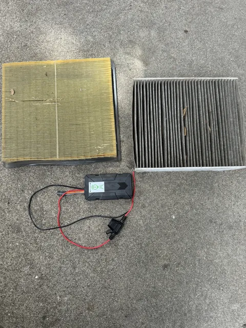 Dealership said all air filters were replaced (84-point inspection), and that they were removing any tracking devices, so I went digging in there to double check
