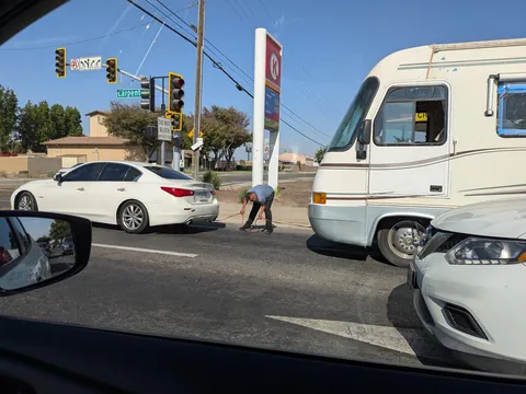 Attempting to tow a stalled RV with a sedan and booster cables. [OC]