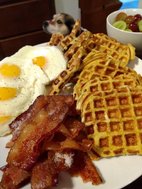 French toast waffles with eggs and bacon
