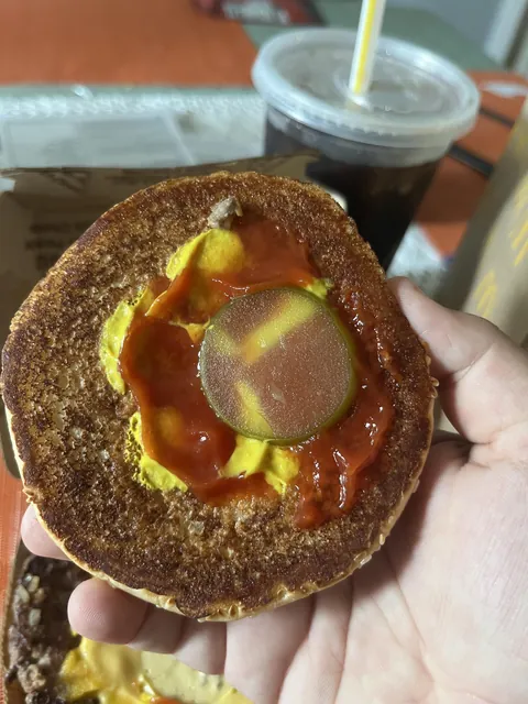 Weirdly transparent seedless pickle on my mcdonald's burger