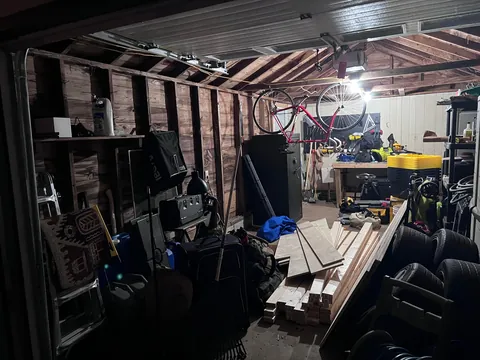 Completed a weekend project! Shelves and a workbench built into my garage.