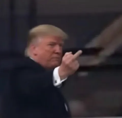 Trump flipped off a Ford worker who yelled ‘pedophile protector.