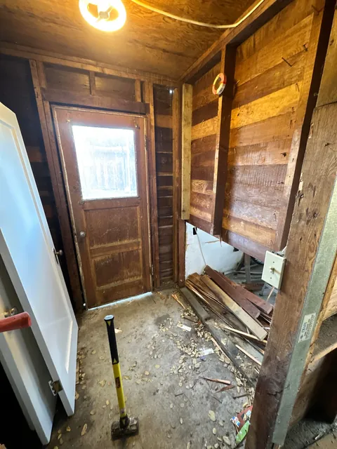 Turned my 1903 three car garage into 1/2 garage and 1/2 bedroom and bathroom my