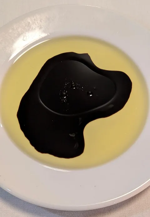 My balsamic vinegar and olive oil looks like a dog in silhouette