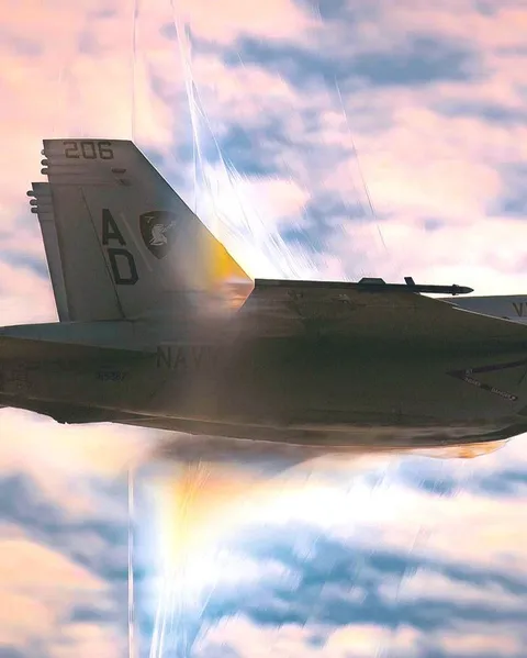 Navy fighter jet photographed while breaking the sound barrier