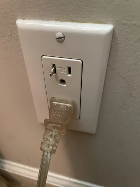 Plug got stuck inside outlet when I pulled my charger out