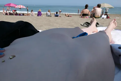 My husband untied the strings and exposed my mound