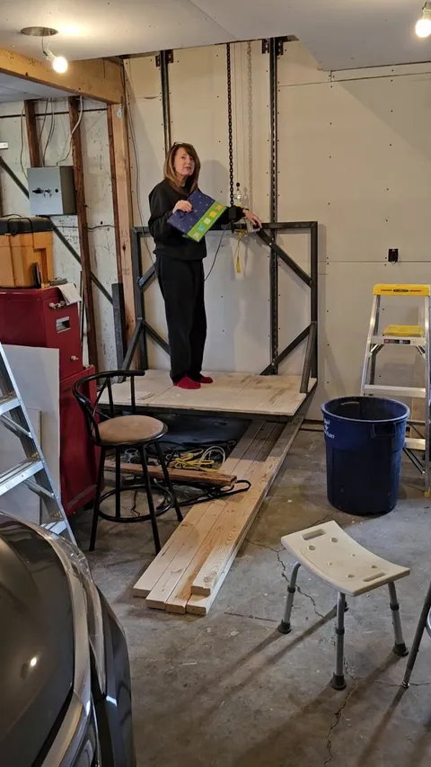 Have a garage with a bit of a vaulted ceiling that I floored off to make an attic space. In the process of drywall/insulation, will post before and after but here's a sneak peak of my homebrew elevator in action