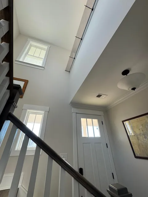 Need help discouraging cats from hanging out on a ledge