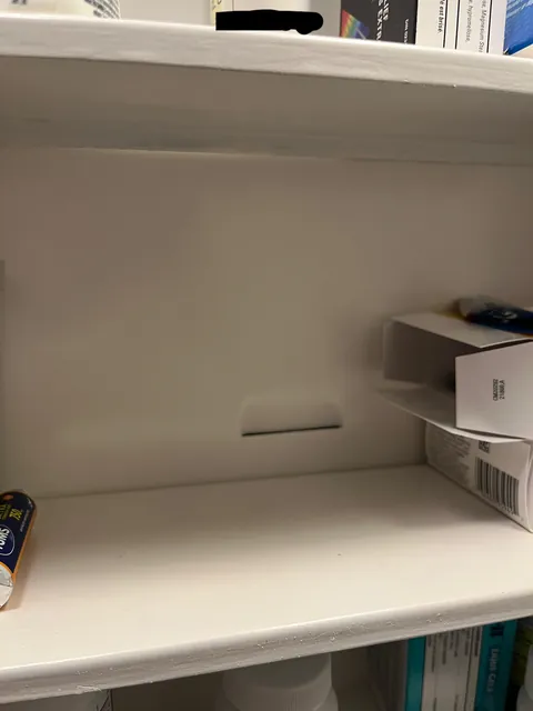 My medicine cabinet has a discard slot for used razor blades. It just drops them inside the wall.