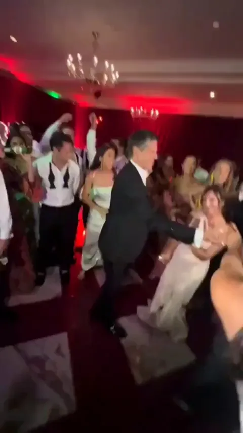 Mother of the bride with the accidental trust fall on the dance floor