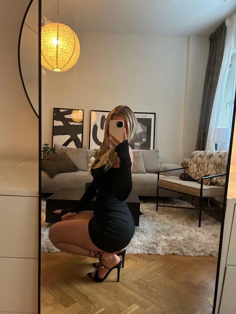 Do you like me in this dress and heels?