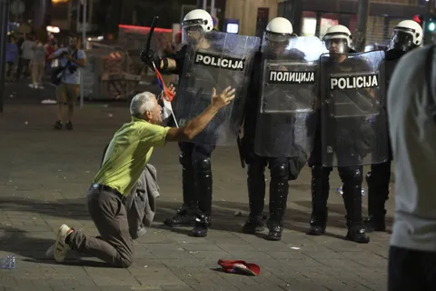 In Serbia, an elderly man fell to his knees and started begging the police to stop beating innocent kids and students who were on the streets protesting the corrupt Serbian government
