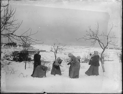 Arab women in snow, Jerusalem, 1921.