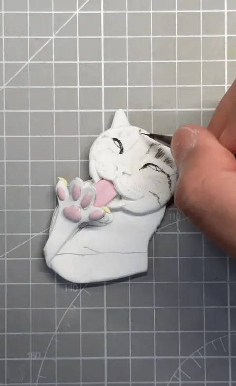 My friend said he had to preserve this moment for his cat, so I made it out of clay!