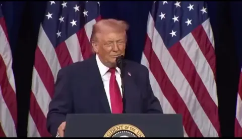 The US President doing whatever the hell this is while addressing House GOP