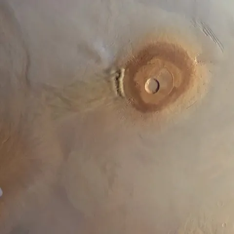 Video of epic Phobos passing over a Martian dust storm near Pavonis Mons. Processed by Andrea Luck