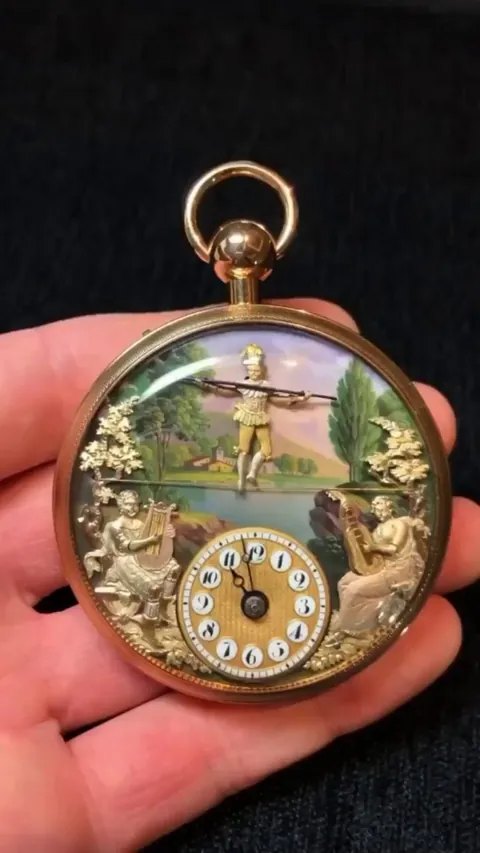 A unique pocket watch with a music box, made in Switzerland around 1810