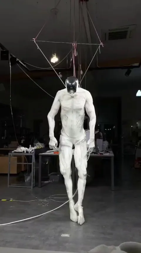 Protoclone is the first bipedal, musculoskeletal android - it has 1,000 myofiber muscles attached to a human-like skeleton, "sweating" through its frame to keep cool