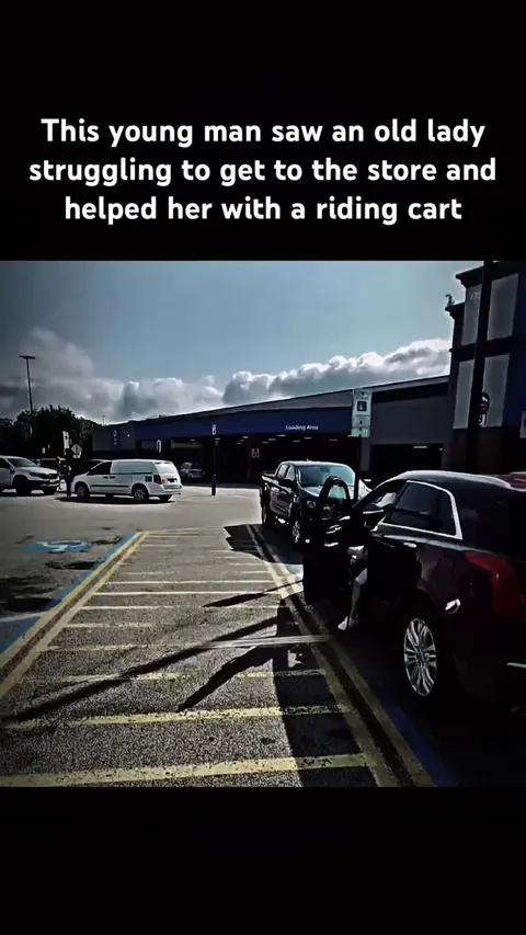 Man helps older woman get a riding cart so she can shop