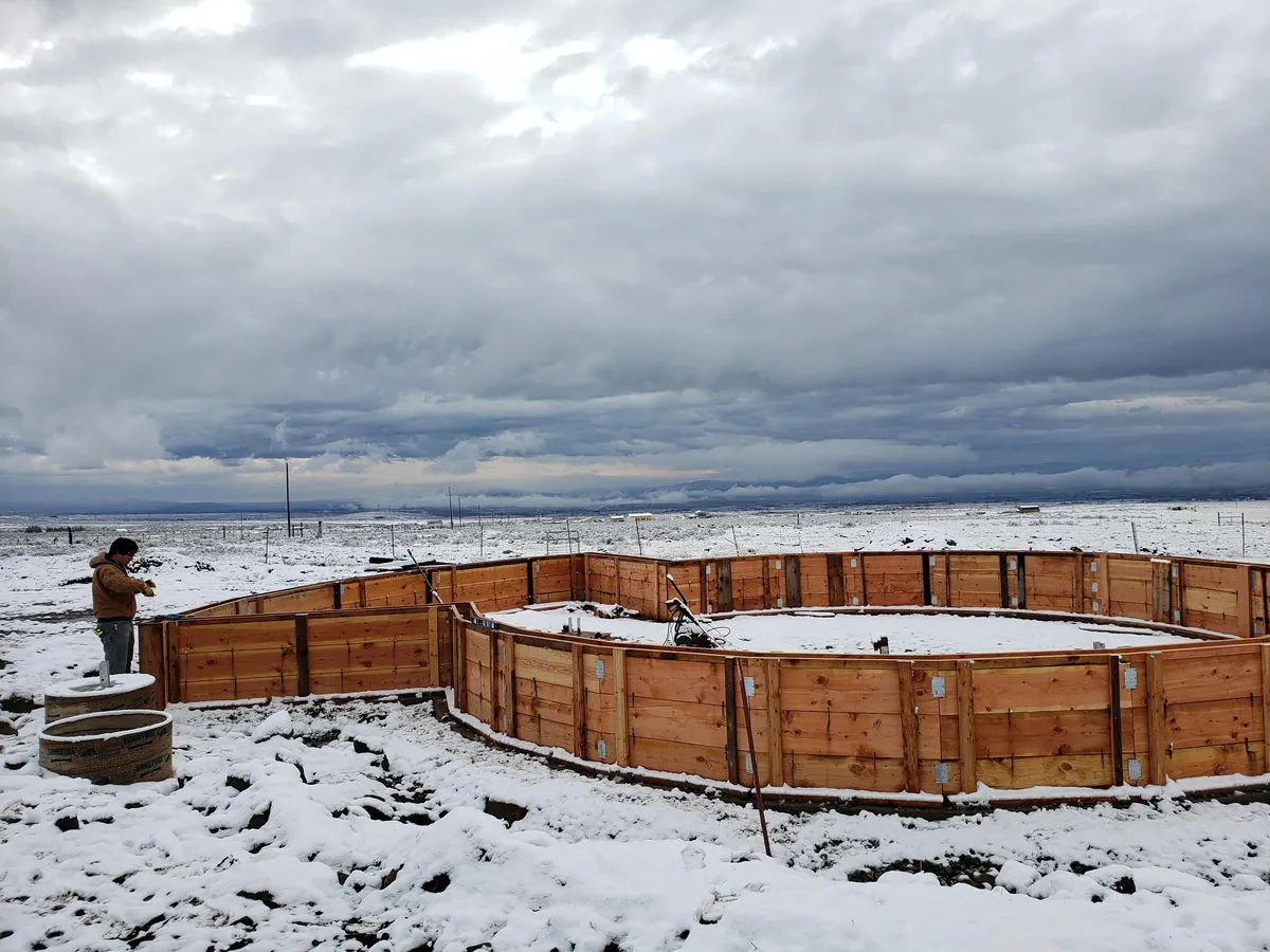 Spent several years building a complete 1300 sq ft roundhouse from top to bottom with my wife, including all framing, electrical, plumbing, HVAC, etc. By far the worst idea we've ever had, and so happy to be in it finally.
