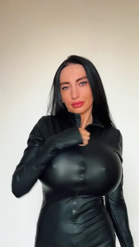 Time to reveal what's hiding under the catsuit...