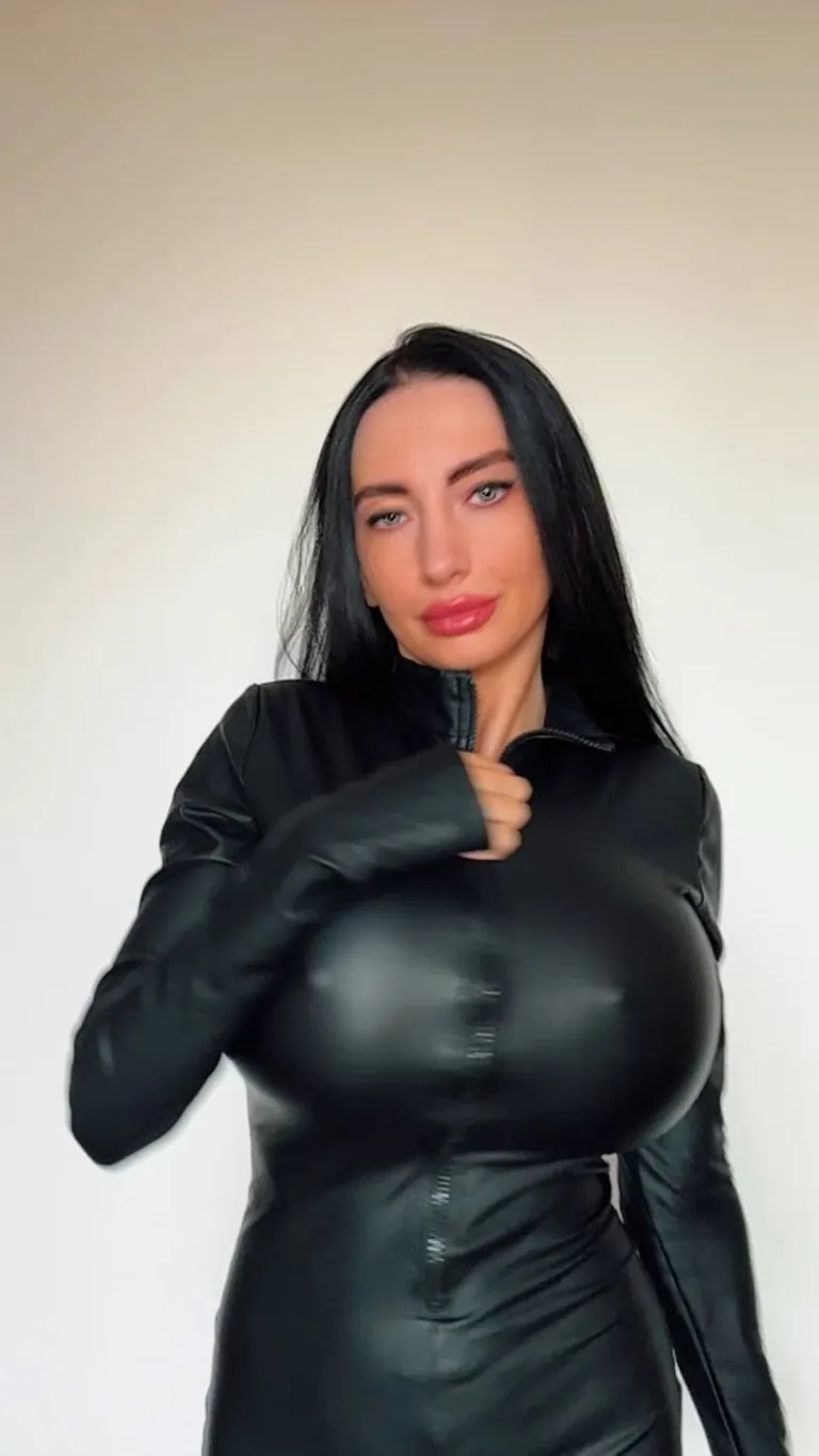 Time to reveal what's hiding under the catsuit...