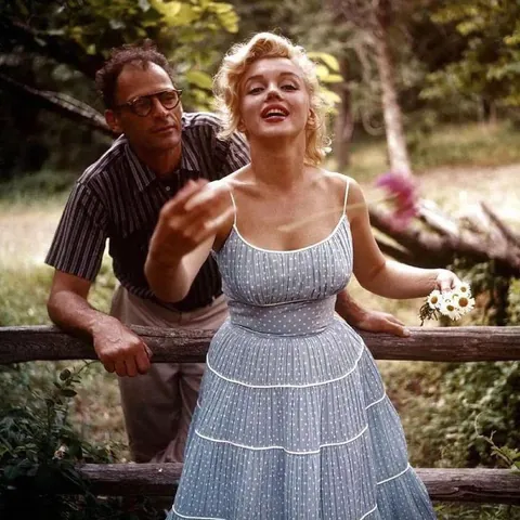 Marilyn Monroe and her husband Arthur Miller photographed at their home in Amagansett, 1957.