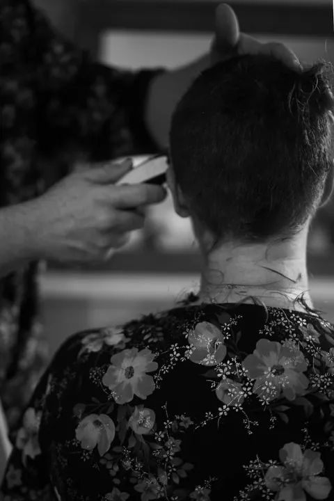 Shaving my head after week one of chemo